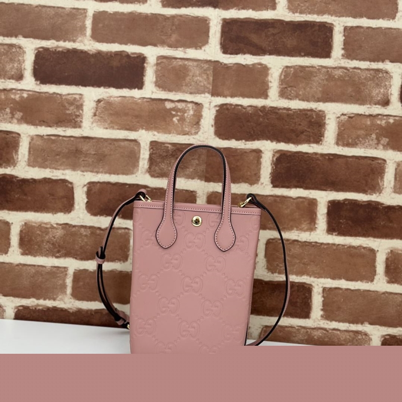 G*u*i top handle bags